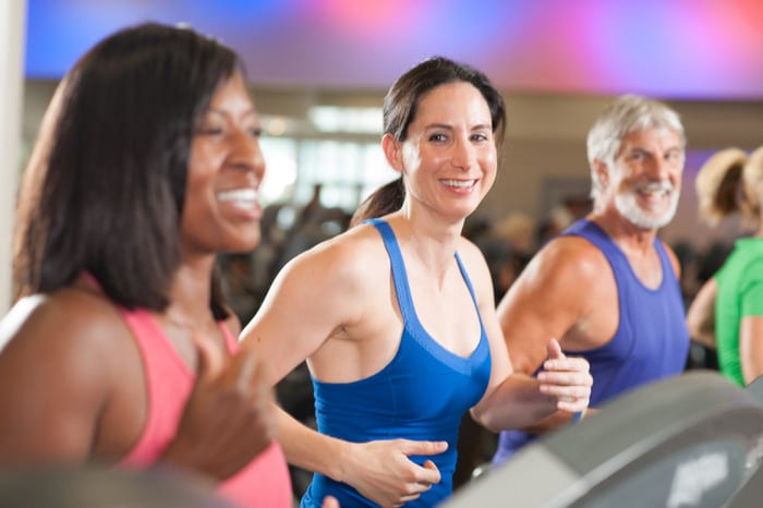 fitness members smiling while cardio training at reisterstown gym