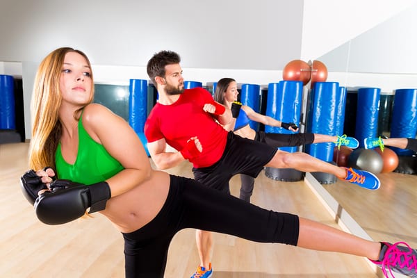 fitness members kickboxing in group class at reistertown gym