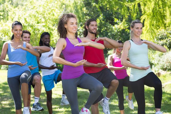 fitness members at brick bodies gym doing outdoor tai chi