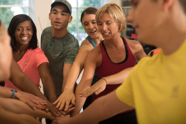 corporate wellness members at rotunda gym showing camaraderie