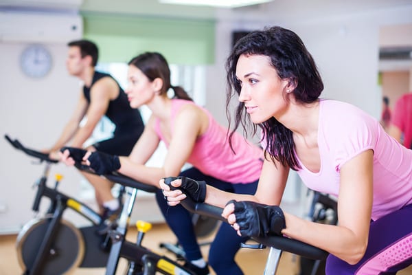 gym members focused in sprint cycling classes at rotunda gym