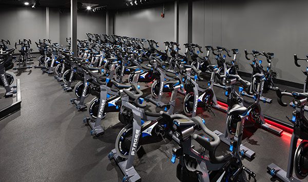 spinning bikes at indoor cycling class in gym in rotunda md