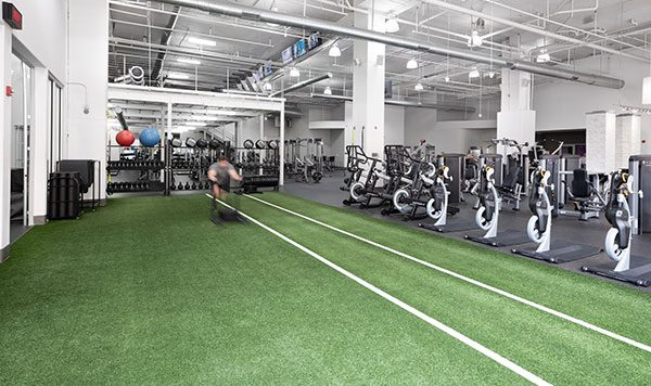 Brick bodies gym rotunda turf