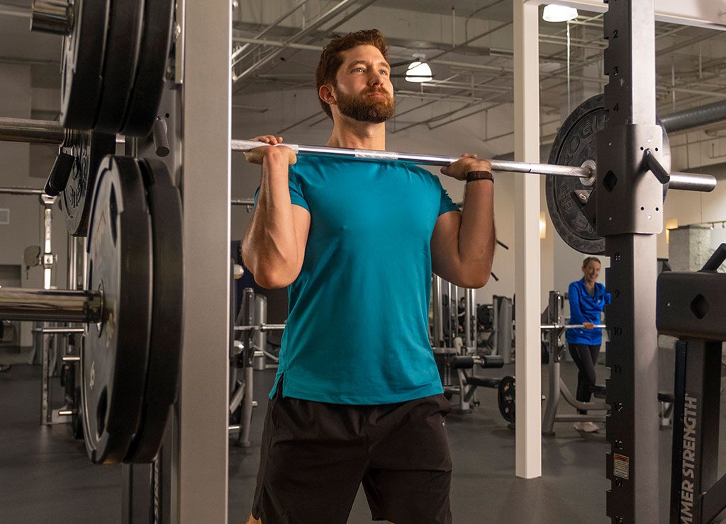 Man lifting barbell