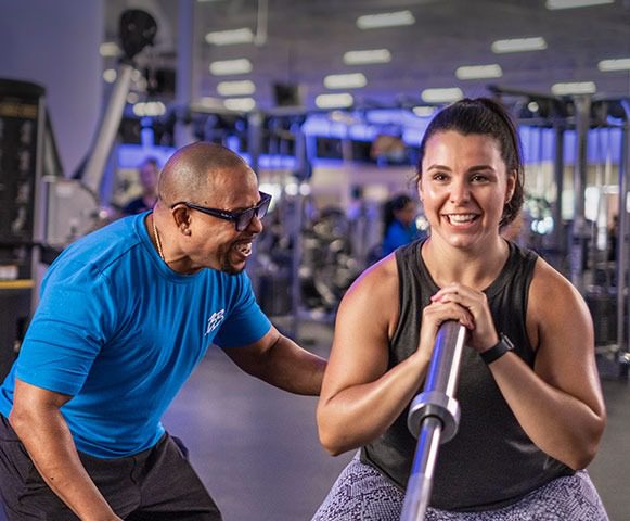 Woman pressing barbell